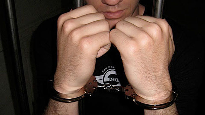fag in handcuffs
