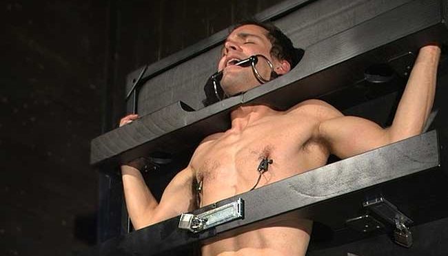 Christian Wilde puts Max Woods into rigid bondage