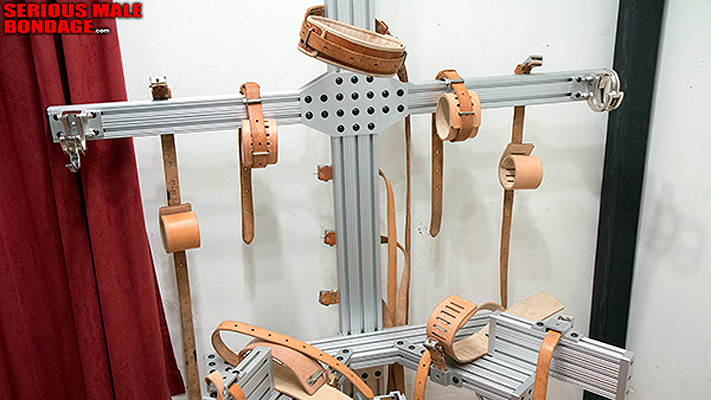 Strapped into a bondage frame