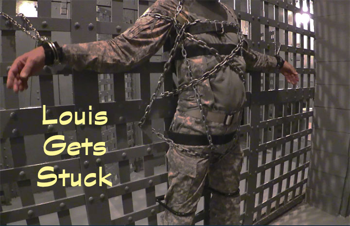 Louis gets locked to the bars in the cellblock