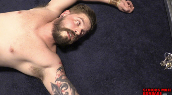 Self-bondage: Lukas Tyler gets caught in the act