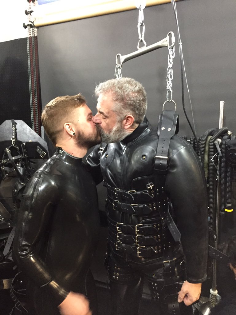 male BDSM kiss