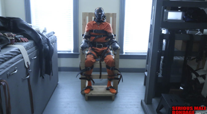 A prisoner in the bondage chair
