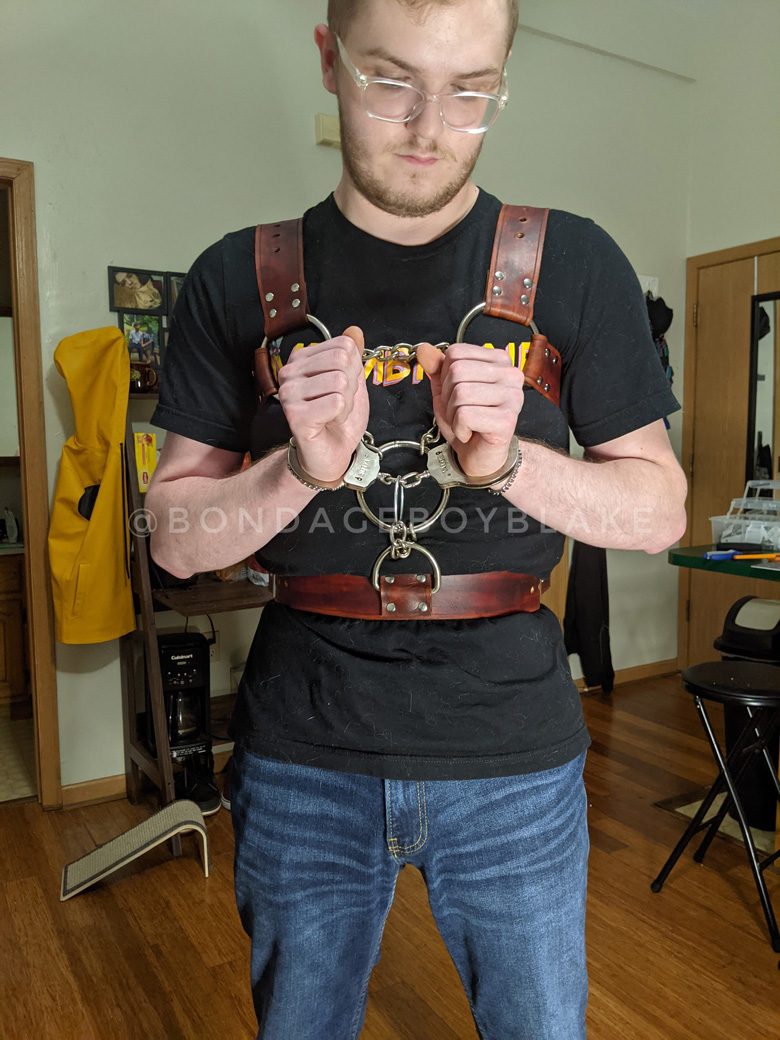 Handcuff harness made and modeled by boy Blake