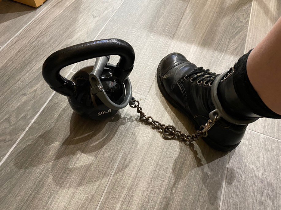self bondage with leg cuffs