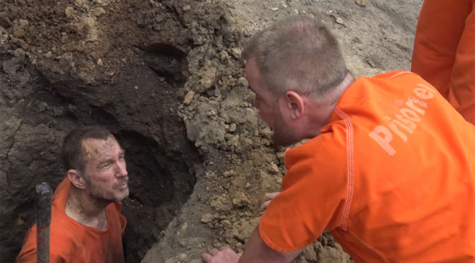 Prisoners get chained to the bars of a jail cell and buried in the mud