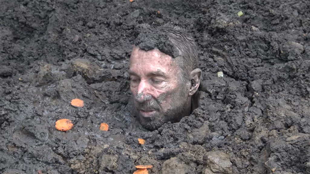 prisoner buried in the mud