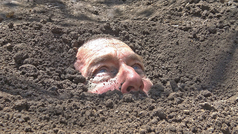 prisoner buried in the dirt