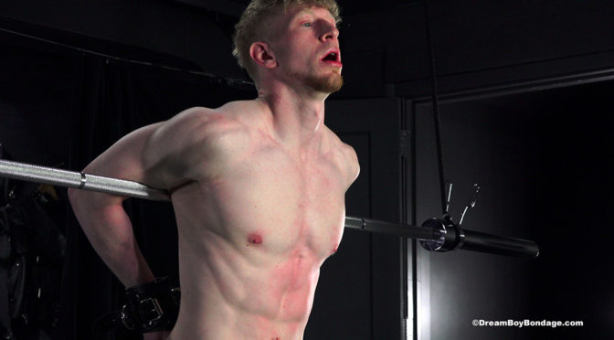 A well-built prisoner is about to endure extreme torture