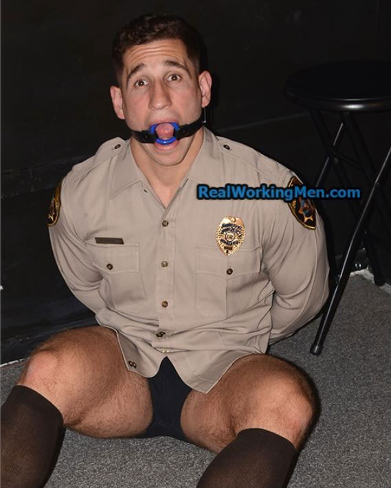 A cop gets cuffed and de-pantsed