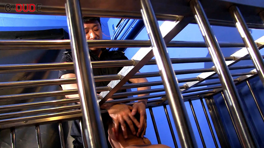 A cop has a prisoner in his cage