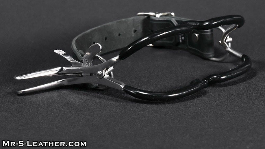 gag the fag Wrench his jaw open and keep him from getting mouthy with the rubber-coated Jaw Master Gag.