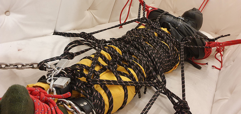 tied up in sleepsack in padded cell