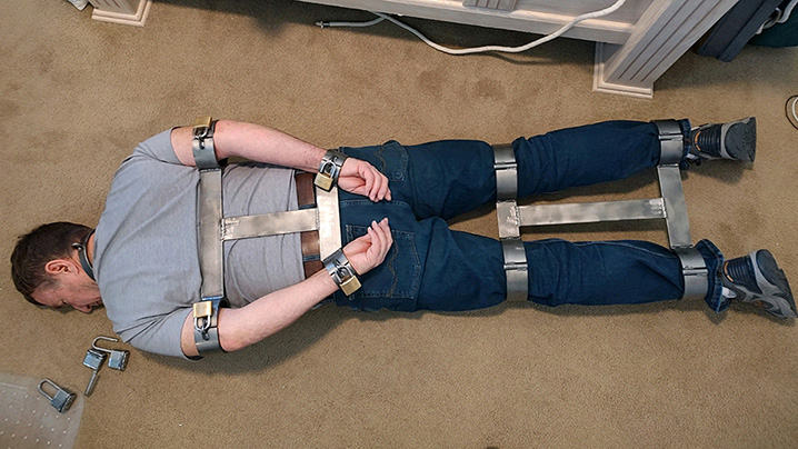 Custom-made rigid metal bondage equipment
