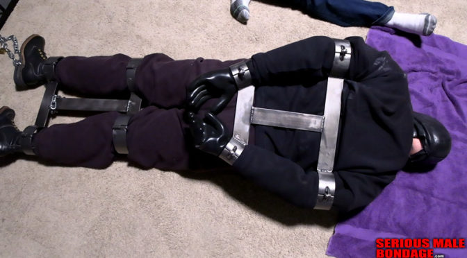 Mark of Serious Male Bondage gets locked in extreme bondage gear