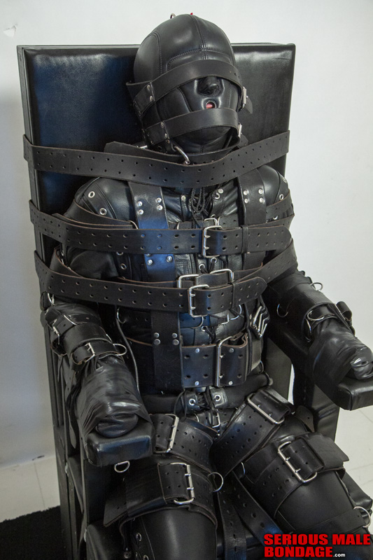 RubCop gets severely restrained in full leather from head to toe