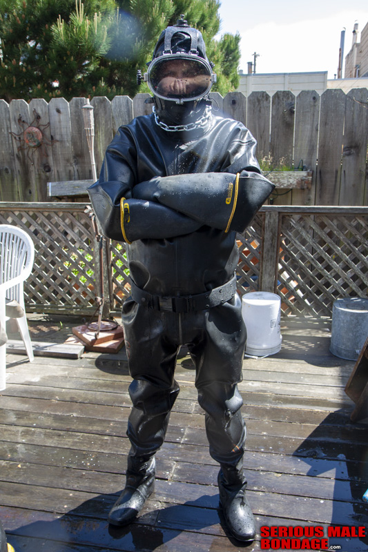 A rubber stud gets bound in a police restraint chair and then gets locked in a pit