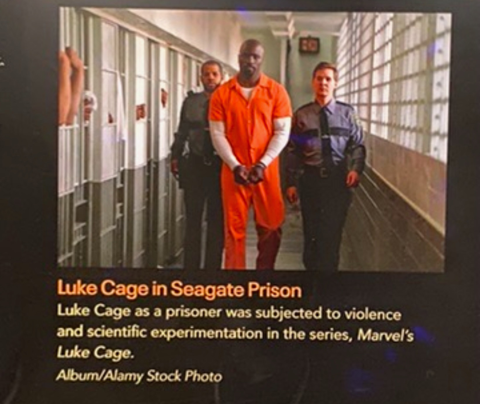 Luke Cage in handcuffs and prison jumpsuit