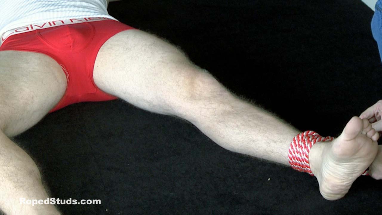 Matt ties Keith spread-eagle on his bed