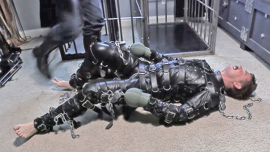Lukas Tyler in a Leather Bondage Suit and Puppy Cage