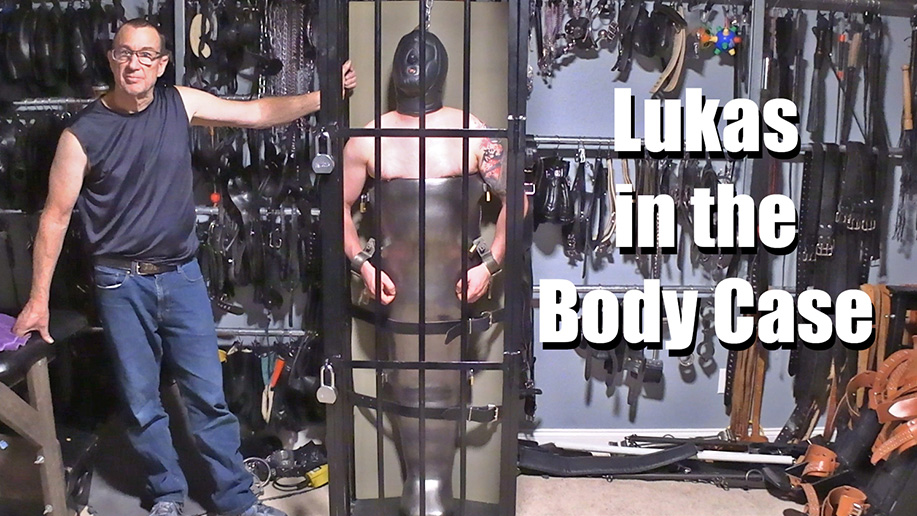 Lukas Tyler in severe male bondage immobilized