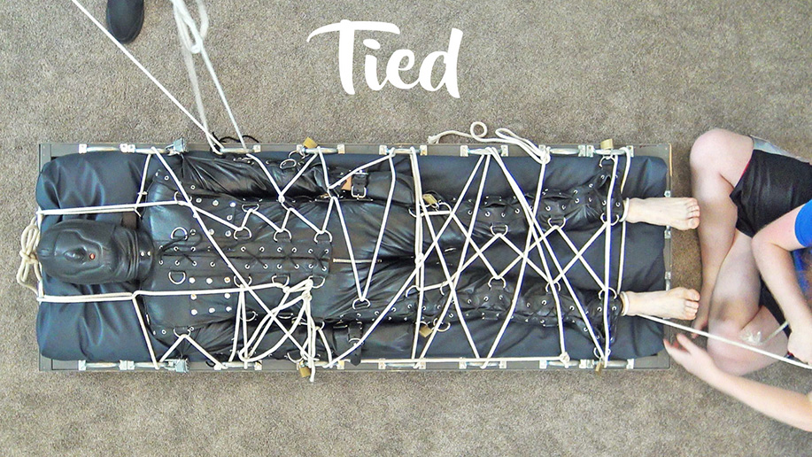 Men in chains and leather and rope