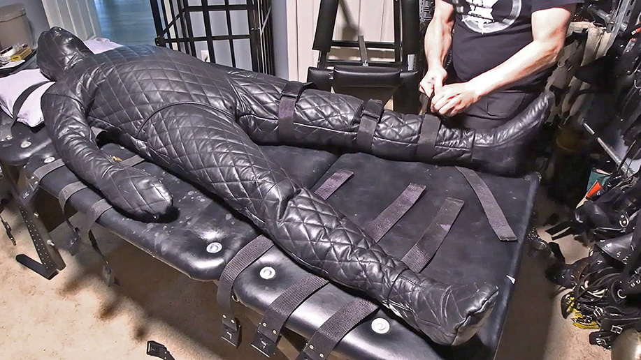 This is the type of leather bondage suit that is depicted in the male bondage story Echo Grove by Stormbound