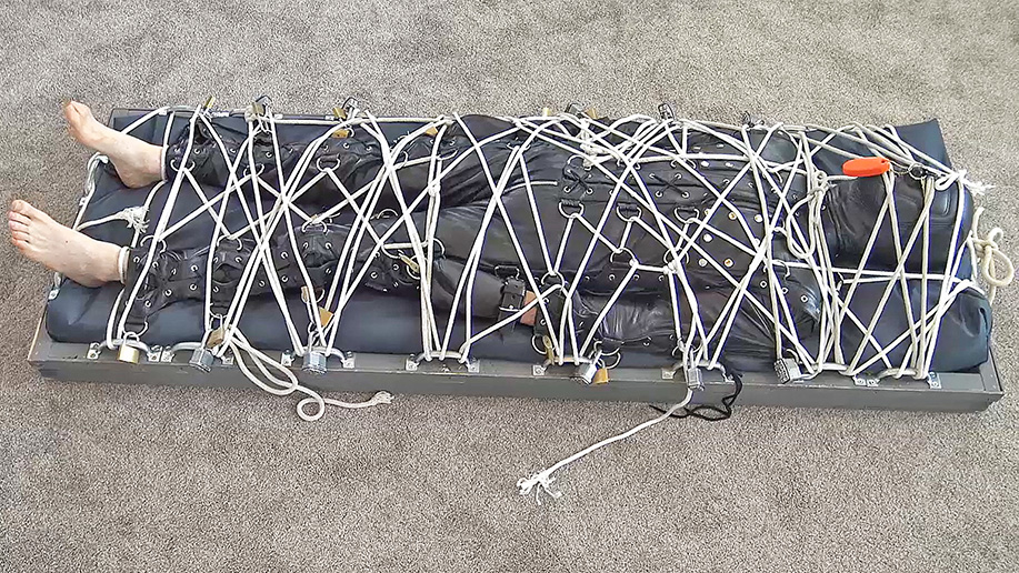 Men in chains and leather and rope