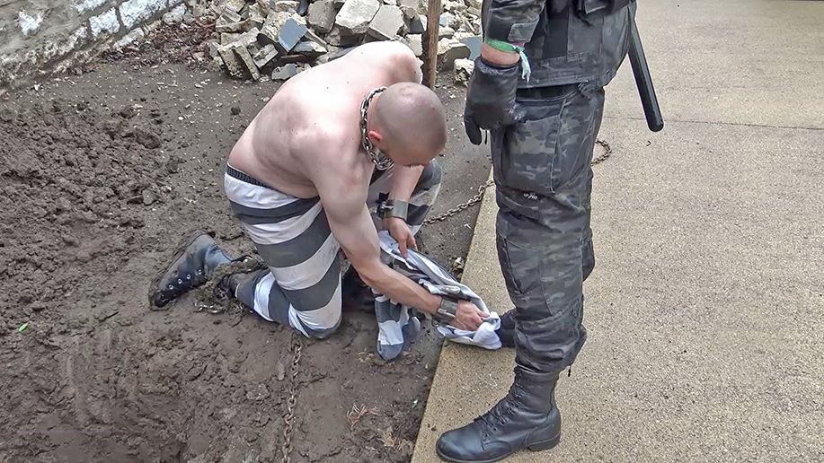 German men in a male BDSM prison discipline video in German