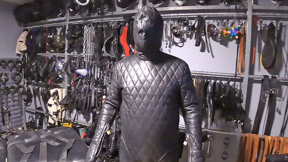 Bound to the Bondage Table in a Leather Prison Suit