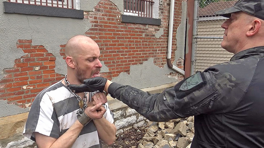 German men in a male BDSM prison discipline video in German