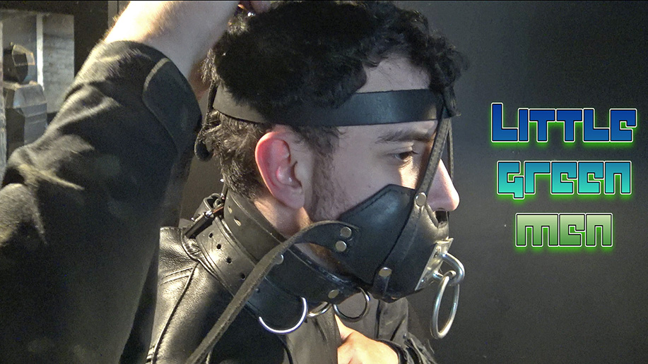 male bondage in a straitjacket and jail cell